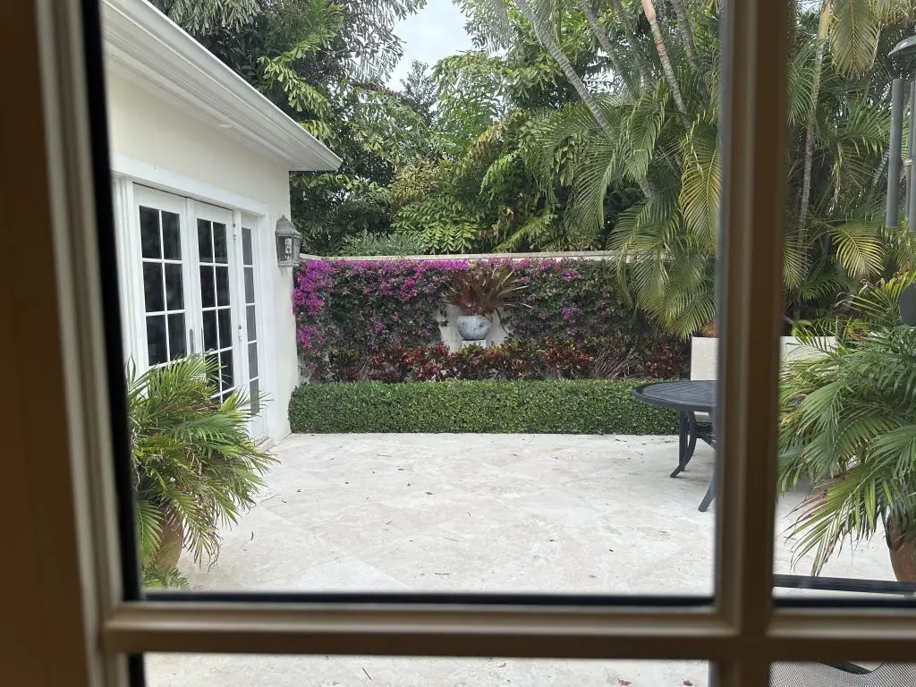 Photo of a patio looking outside from the inside of the home in south florida.
