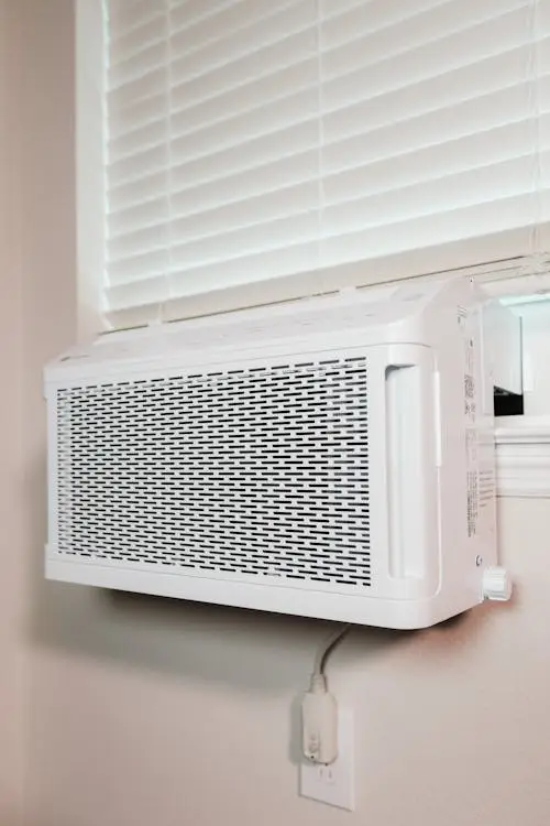 air conditioner unit installed in home window cooling South Florida allergies air quality